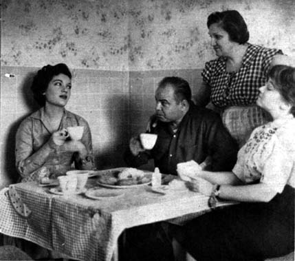 Connie having tea with Mom and Dad