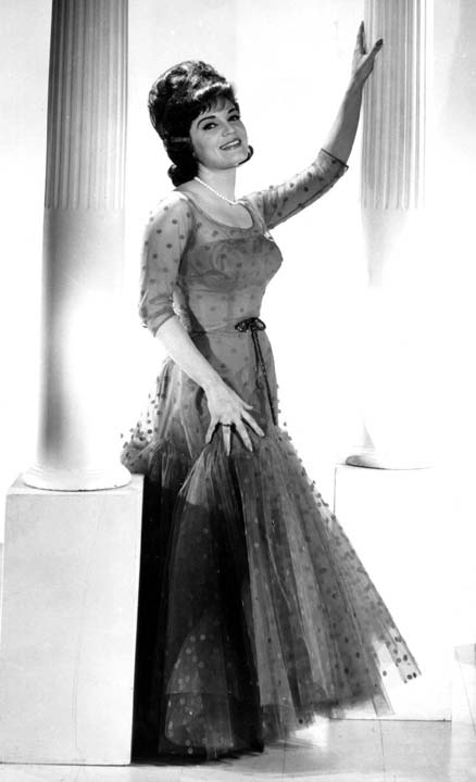 Connie in full length Don Loper gown