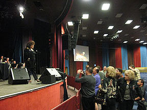 Connie poses for 'paparazzi' of fans during a break from rehearsal