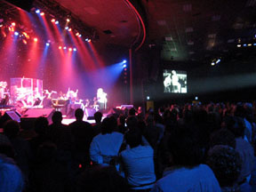Connie sings God Bless America, and audience stands