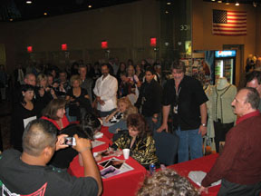 Connie signing autographs