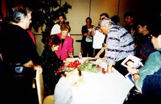 Connie signing autographs