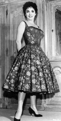 Gina wearing a party dress