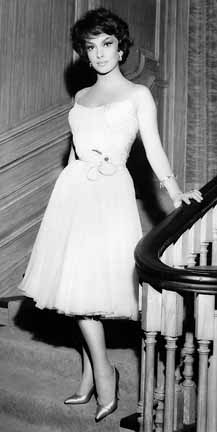 Gina in the movie Never So Few