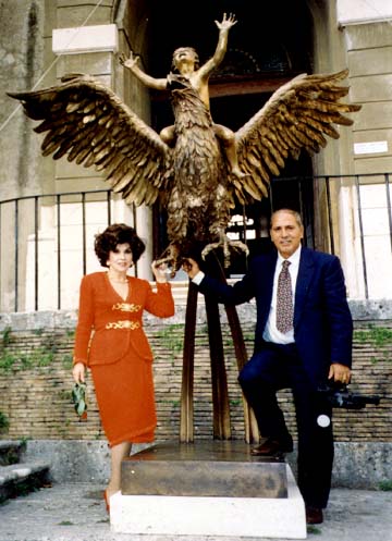 Gina with sculpture and a friend